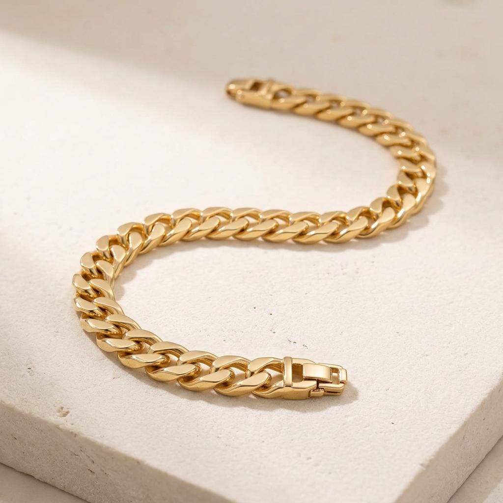 Close-up of a gold plated Cuban link bracelet