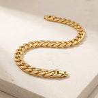 Close-up of a gold plated Cuban link bracelet